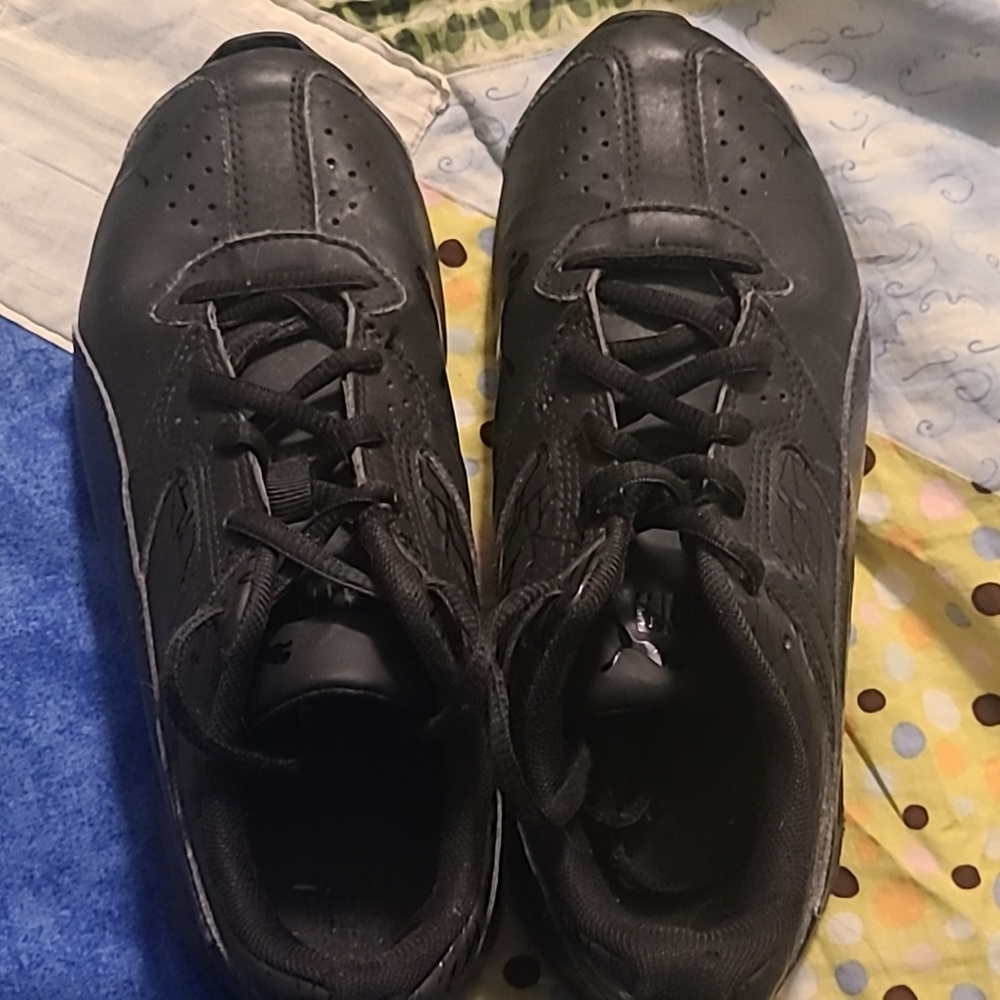 all black Puma tennis shoes size 3C